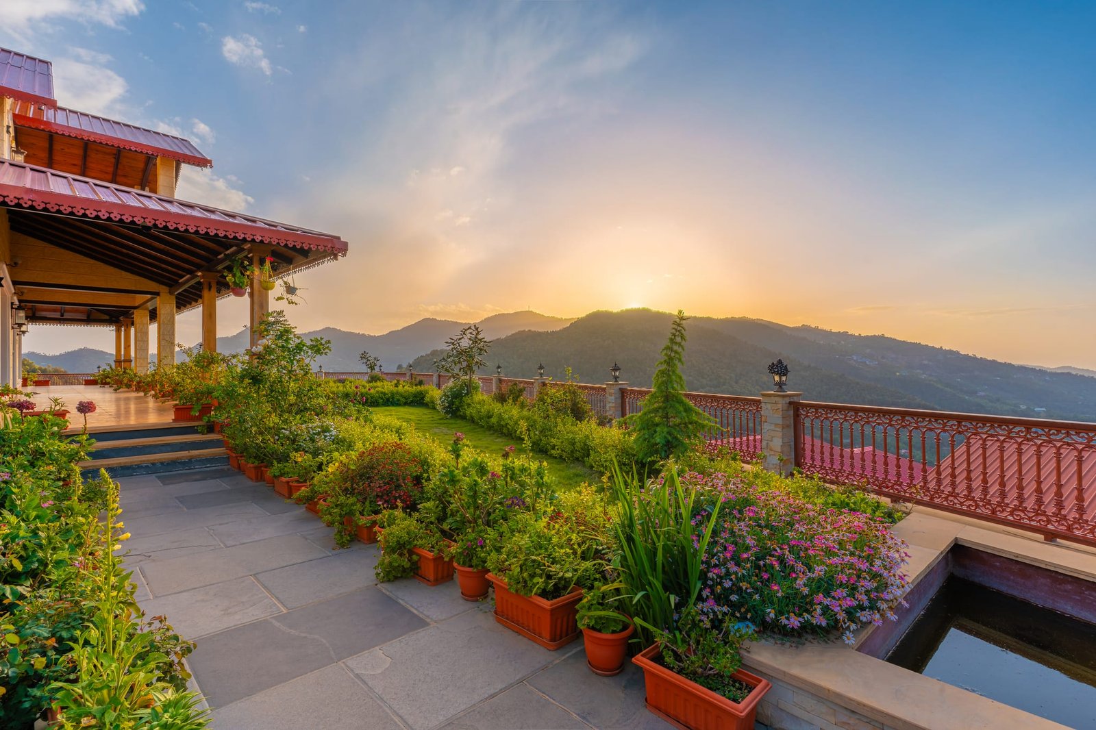 Sunset perspective over the garden terrace and mountain hills