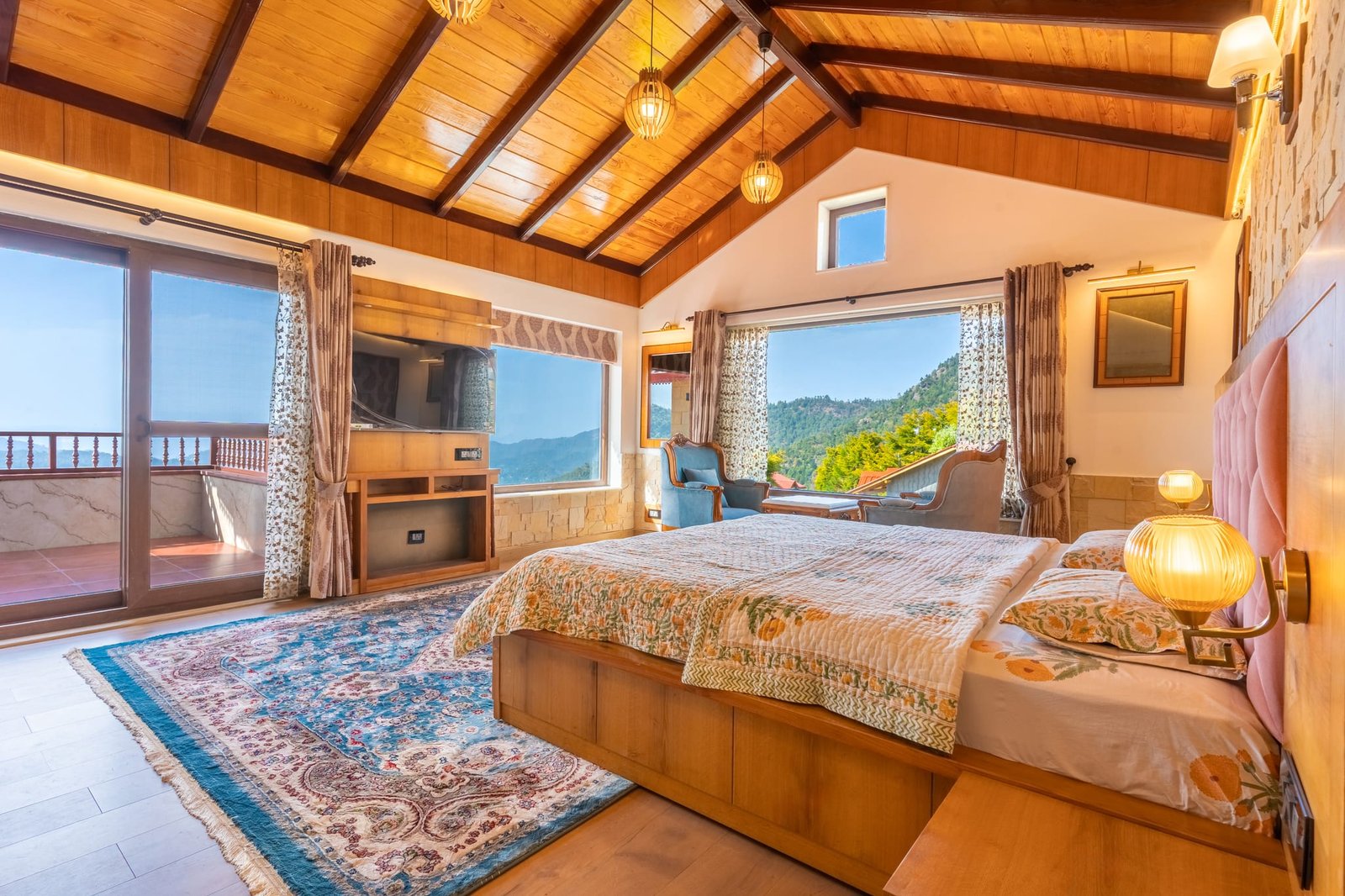 Cozy reading armchair and dressing area in The Himalayan Suite