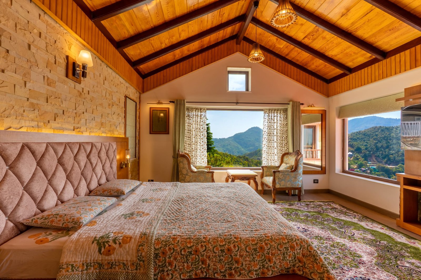Deluxe king bed setup in The Signature Himalayan suite